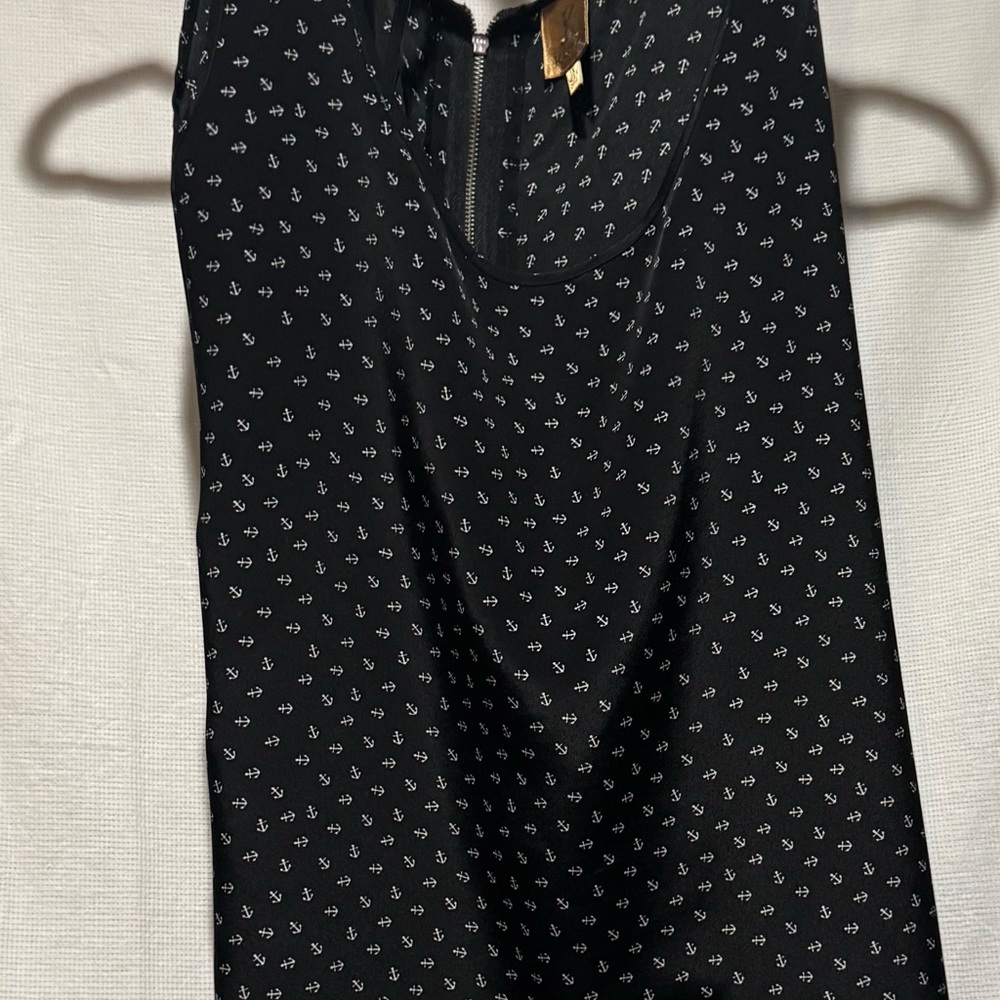 Black Sleeveless Top with White Pattern